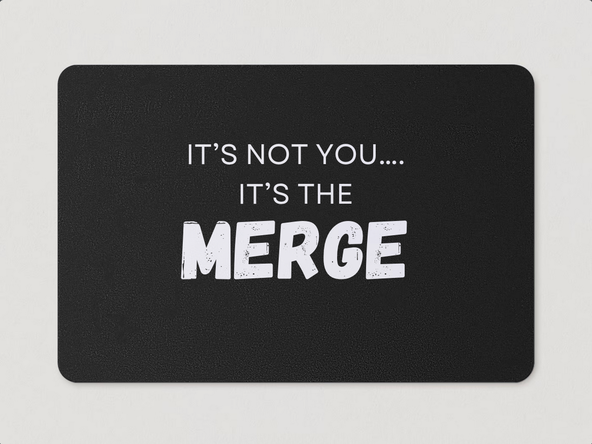 Magnet with "It's Not You...It's the Merge" written in white text on a black background