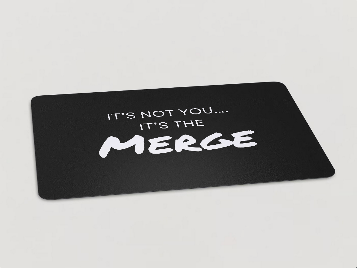 Magnet with "It's Not You...It's the Merge" written in white text on a black background