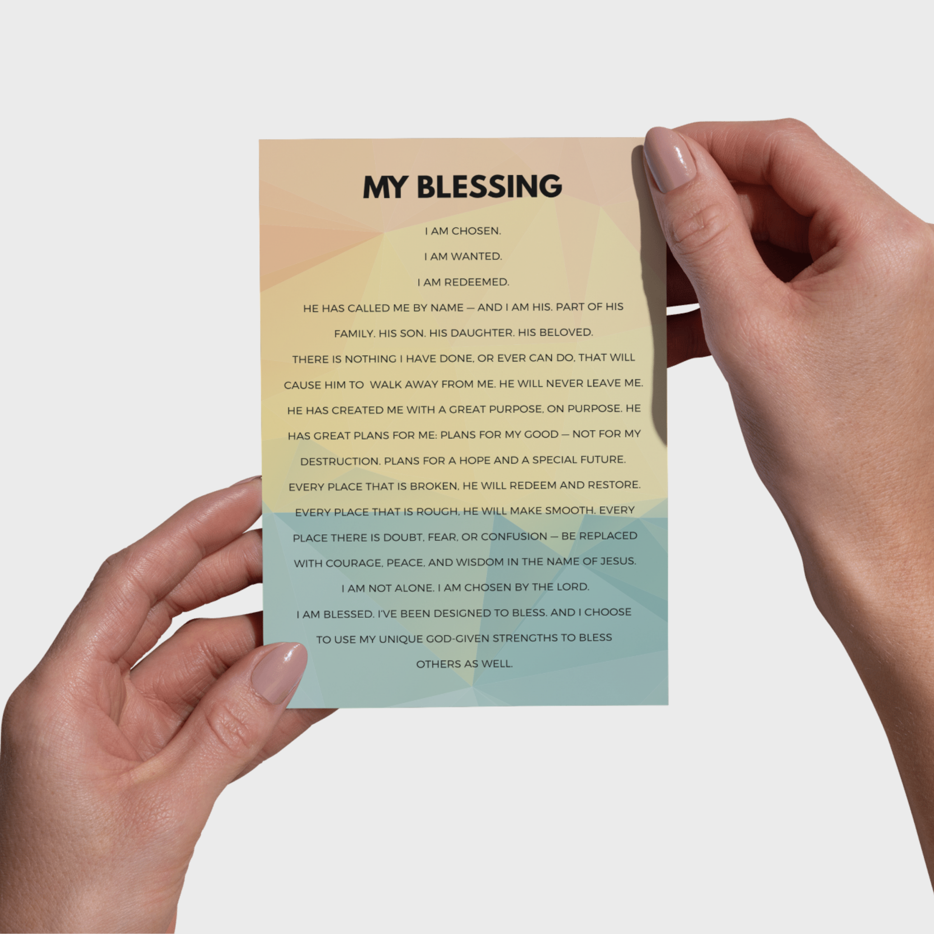 Hands holding a 5x7 print with 'My Blessing' text on a gradient background