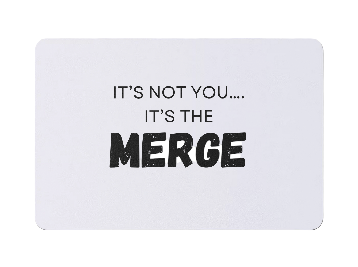 A magnet with the text 'It's Not You, It's The Merge' on a white background.