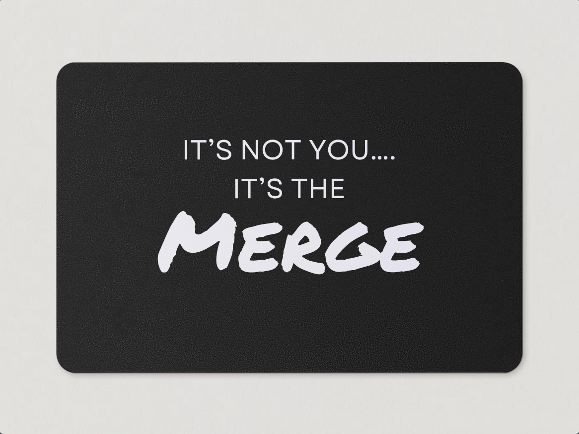 Magnet with "It's Not You...It's the Merge" written in white text on a black background
